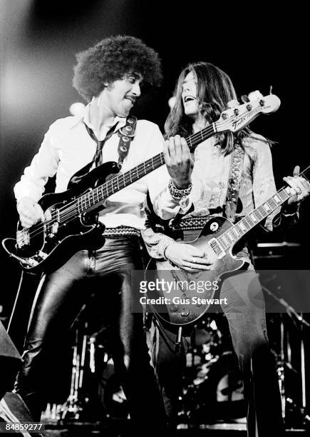 Photo of THIN LIZZY and Phil LYNOTT and Scott GORHAM, Phil Lynott and Scott Gorham performing on stage