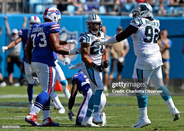 Carolina Panthers safety Kurt Coleman, center, celebrates the defensive stop of Buffalo Bills running back LeSean McCoy on a run during third quarter...