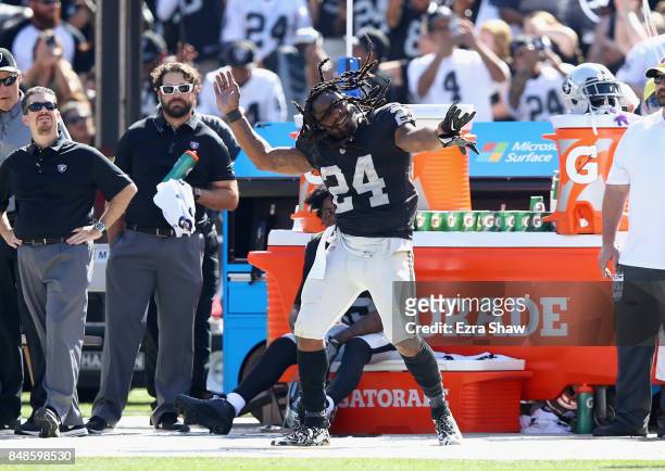 Marshawn Lynch of the Oakland Raiders dances on the sideline during their win over the New York Jets at Oakland-Alameda County Coliseum on September...