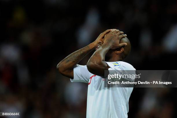 England's Jermain Defoe reacts after missing a chance on goal during the 2014 FIFA World Cup Qualifying match at Wembley Stadium, London.