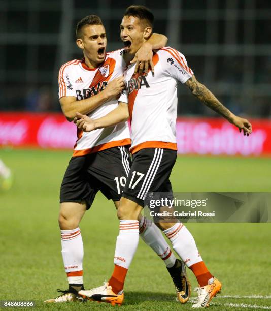 Carlos Auzqui of River Plate celebrates with teammates after scoring the second goal of his team during a match between San Martin de San Juan and...