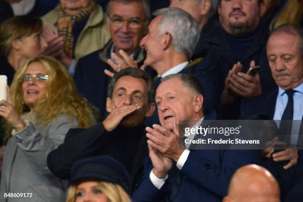 France former president Nicolas Sarkozy and the president of Olympique Lyonnais Football Club Jean Michel Aulas speak during the Ligue 1 match...