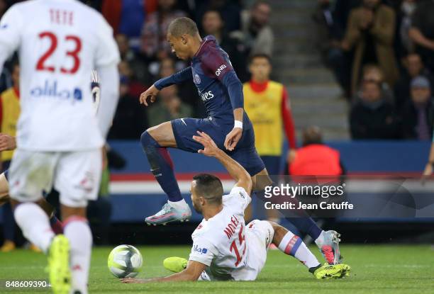 Kylian Mbappe of PSG, Jeremy Morel of Lyon during the French Ligue 1 match between Paris Saint Germain and Olympique Lyonnais at Parc des Princes on...