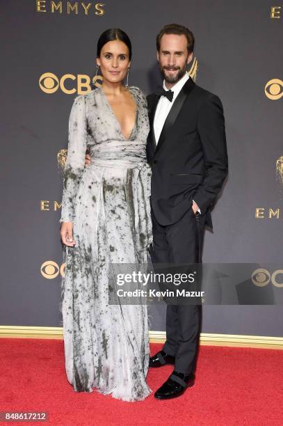 Actors Maria Dolores Dieguez and Joseph Fiennes attend the 69th Annual Primetime Emmy Awards at Microsoft Theater on September 17, 2017 in Los...