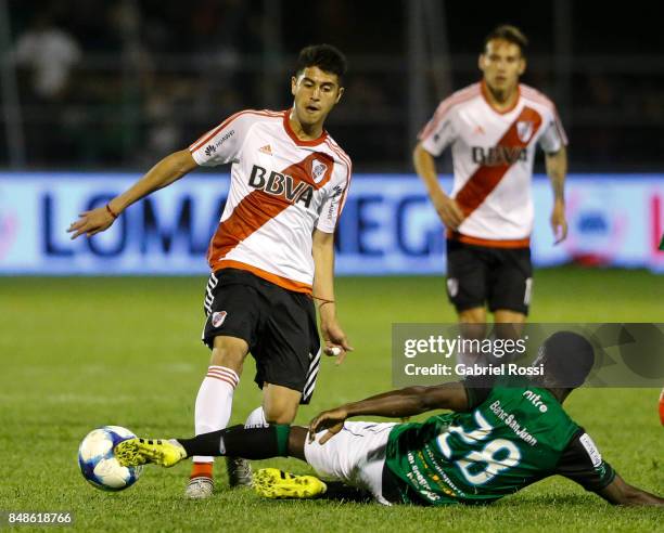 Exequiel Palacios of River Plate fights for the ball with Mauricio Casierra of San Martin during a match between San Martin de San Juan and River...