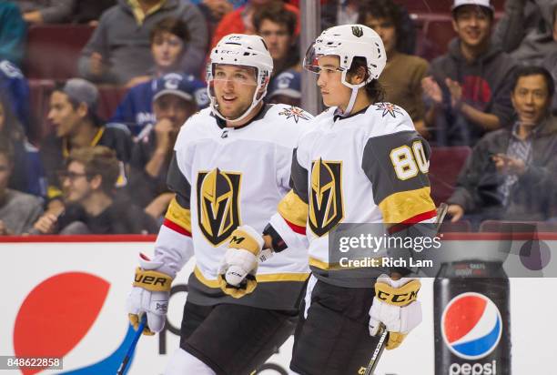 Tyler Wong of the Vegas Golden Knights is congratulated by teammate Stefan Matteau after scoring his third goal of the game against the Vancouver...