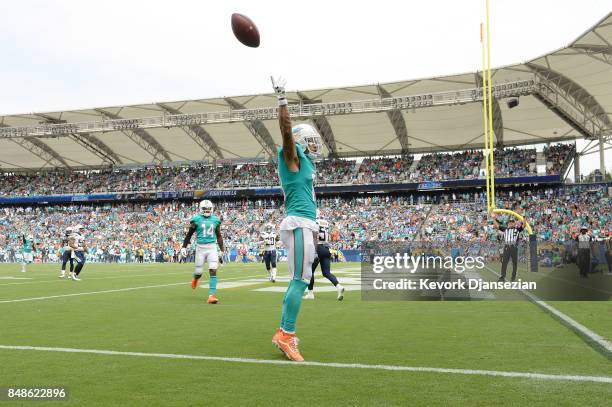 Kenny Stills of the Miami Dolphins celebrates after scoring a touchdown during the game against the Los Angeles Chargers at the StubHub Center on...