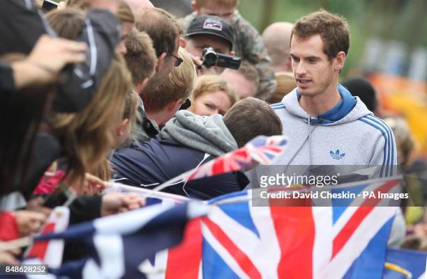 Olympic and US Open champion Andy Murray parades through Dunblane, near Stirling in Scotland, making the return to his home town to thank fans for...