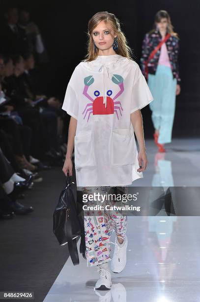 Model walks the runway at the Emporio Armani Spring Summer 2018 fashion show during London Fashion Week on September 17, 2017 in London, United...