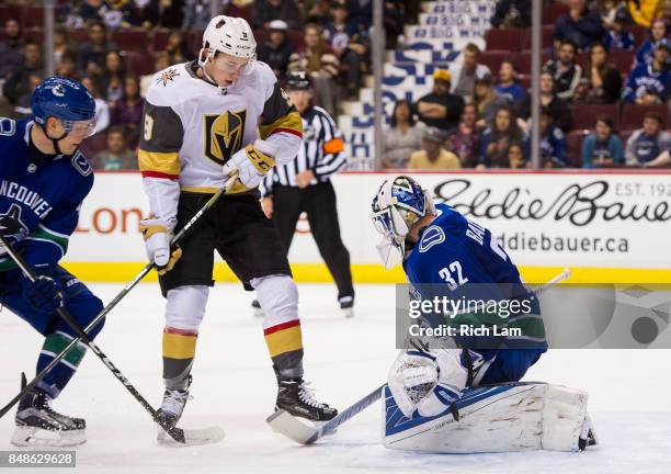 Cody Glass of the Vegas Golden Knights looks for a rebound after goalie Richard Bachman of the Vancouver Canucks stops a shot in NHL pre-season...