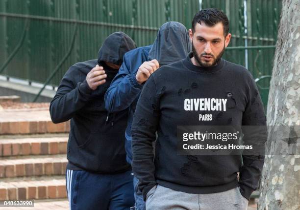 Supporters of Michael and Fadi Ibrahim, Mustapha Dib and Koder Jomaa arrive at Sydney Central Local Court on September 18, 2017 in Sydney, Australia....