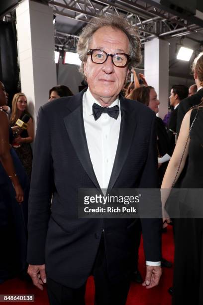 Actor Geoffrey Rush walks the red carpet during the 69th Annual Primetime Emmy Awards at Microsoft Theater on September 17, 2017 in Los Angeles,...