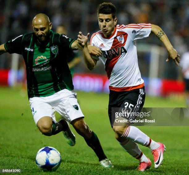 Tomas Andrade of River Plate fights for the ball with Gonzalo Prosperi of San Martin during a match between San Martin de San Juan and River Plate as...
