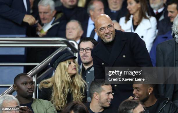 Pascal Obispo and his wife Julie Hantson attend the French Ligue 1 match between Paris Saint Germain and Olympique Lyonnais at Parc des Princes on...