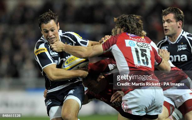 Sale Sharks Rob Miller is tackled by London Welsh's Tom Arscott during the Aviva Premiership match at Salford City Stadium, Salford.