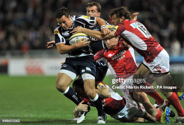 Sale Sharks Rob Miller is tackled by London Welsh's Tom Arscott during the Aviva Premiership match at Salford City Stadium, Salford.