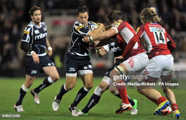 Sale Sharks Rob Milller is tackled by London Welsh's Ed Jackson during the Aviva Premiership match at Salford City Stadium, Salford.