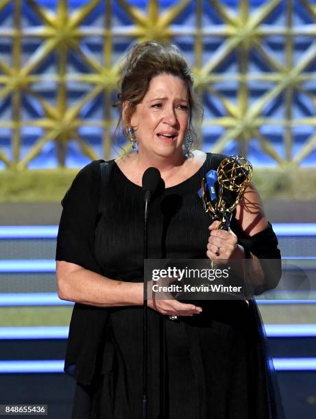 Actor Ann Dowd accepts the Outstanding Supporting Actress in a Drama Series for "The Handmaid's Tale" onstage during the 69th Annual Primetime Emmy...