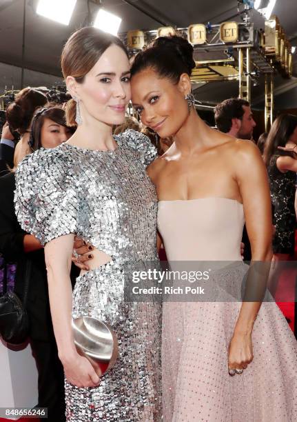 Actors Sarah Paulson and Thandie Newton walk the red carpet during the 69th Annual Primetime Emmy Awards at Microsoft Theater on September 17, 2017...