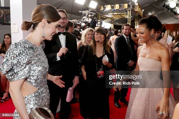 Actors Sarah Paulson and Thandie Newton walk the red carpet during the 69th Annual Primetime Emmy Awards at Microsoft Theater on September 17, 2017...