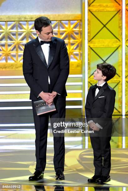 Actors Jim Parsons and Iain Armitage speak onstage during the 69th Annual Primetime Emmy Awards at Microsoft Theater on September 17, 2017 in Los...