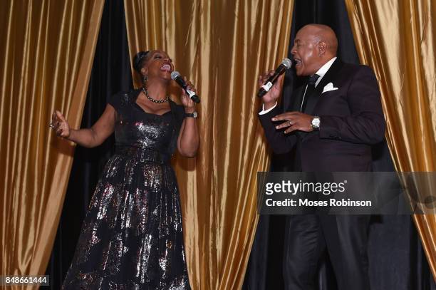 Recording artist Regina Belle and recording artist Peabo Bryson perform at the 2017 DMF Care for Congo Gala at St. Regis Hotel on September 16, 2017...