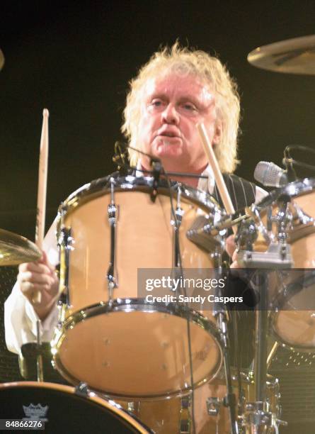 Photo of QUEEN and Roger TAYLOR; Roger Taylor performing on stage at the Olympiahalle