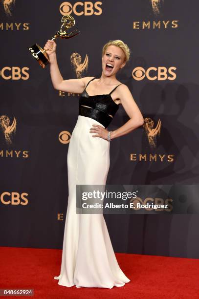 Actor Kate McKinnon, winner of Outstanding Supporting Actress in a Comedy Series for 'Saturday Night Live', poses in the press room during the 69th...