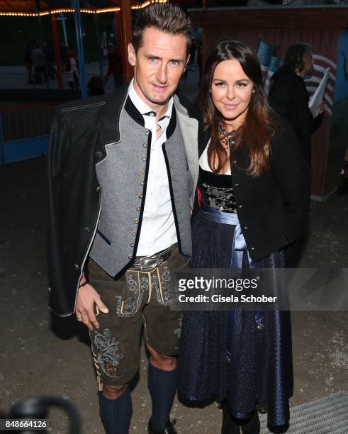 Miroslav Klose and his wife Sylwia Klose during the 'Almauftrieb' as part of the Oktoberfest 2017 at Kaeferschaenke Tent on September 17, 2016 in...
