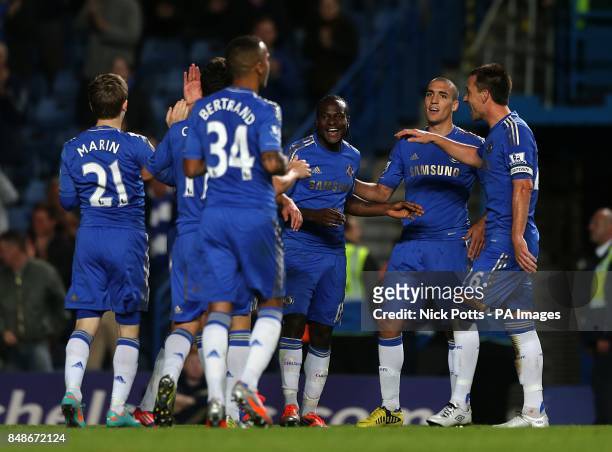 Chelsea's Victor Moses celebrates scoring his side's sixth goal with his team-mates