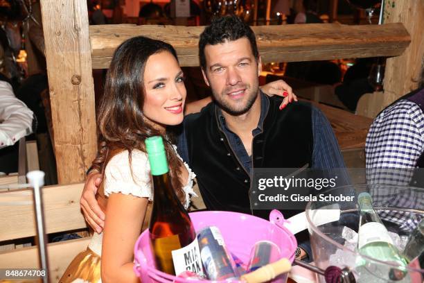 Michael Ballack and his girlfriend Natacha Tannous during the 'Almauftrieb' as part of the Oktoberfest 2017 at Kaeferschaenke Tent on September 17,...