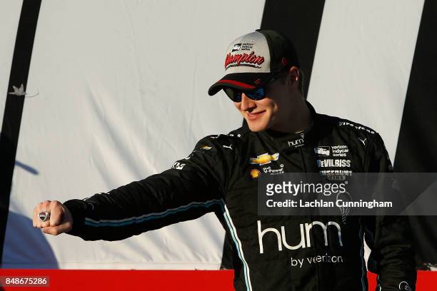 Josef Newgarden of the United States driver of the hum by Verizon Chevrolet shows off his Championship ring after winning the 2017 Verison IndyCar...