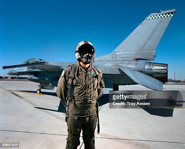 fighter pilot in front of jet - us air force stock-fotos und bilder