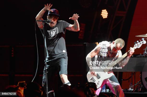 Musicians Anthony Kiedis and Flea of Red Hot Chili Peppers performs onstage during the Meadows Music and Arts Festival - Day 3 at Citi Field on...