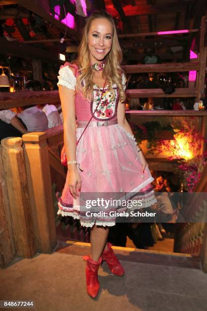 Sylvia Walker wearing a dirndl by Lola Paltinger during the 'Almauftrieb' as part of the Oktoberfest 2017 at Kaeferschaenke Tent on September 17,...