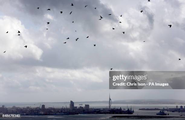 Rain showers move towards Portsmouth and its landmark Spinnaker Tower as rain causes misery for many across the UK, particularly in the north.