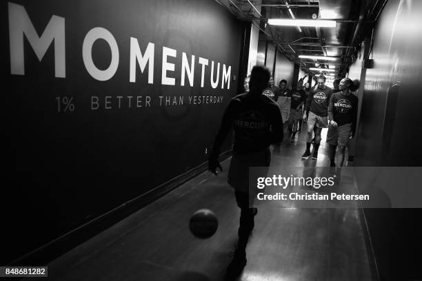 Danielle Robinson of the Phoenix Mercury leads teammates out to the court before the semifinal game three of the 2017 WNBA Playoffs against the Los...