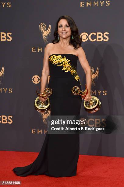 Actor Julia Louis-Dreyfus, winner of the award for Outstanding Comedy Actress for 'Veep,' poses in the press room during the 69th Annual Primetime...