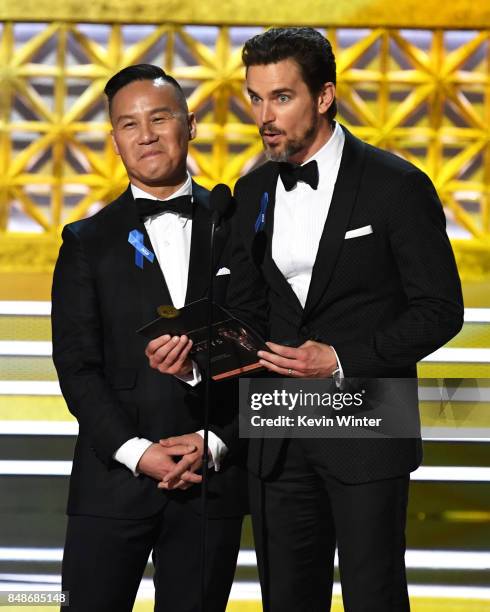 Actor BD Wong and Matt Bomer speak onstage during the 69th Annual Primetime Emmy Awards at Microsoft Theater on September 17, 2017 in Los Angeles,...