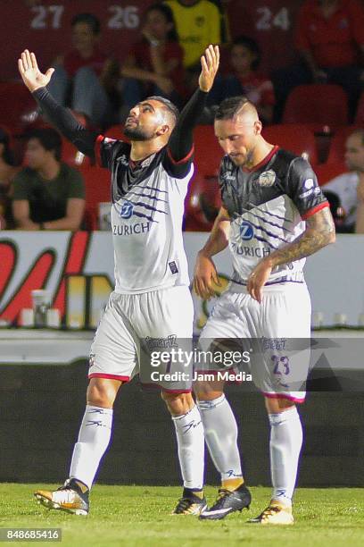 Amaury Escoto of Lobos BUAP celebrates after scoring the first goal of his team during the 9th round match between Veracruz and Lobos BUAP as part of...