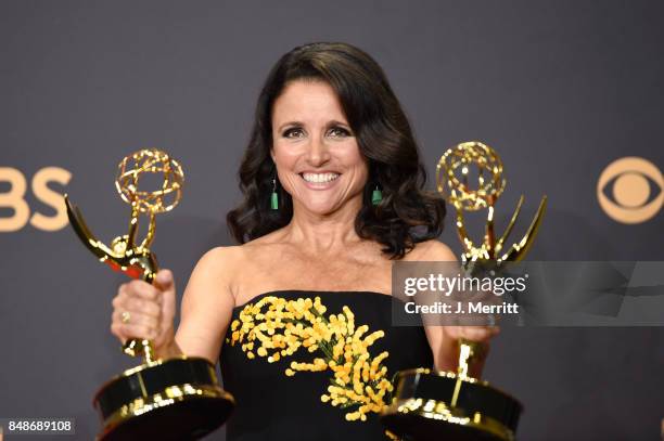 Actor Julia Louis-Dreyfus, winner of the award for Outstanding Comedy Actress for 'Veep,' poses in the press room during the 69th Annual Primetime...