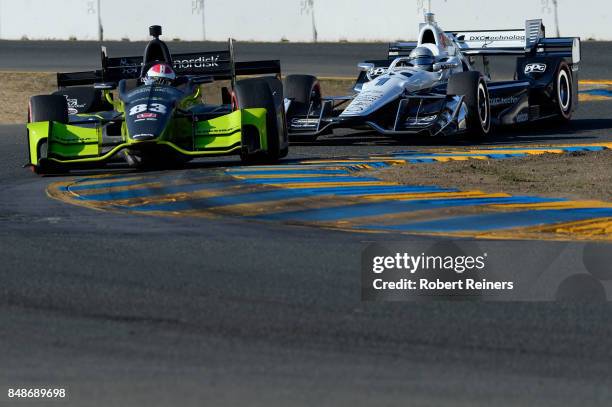 Charlie Kimball, driver of the Tresiba Honda, leads Simon Pagenaud, driver of the DXC Technology Chevrolet, during the Verizon IndyCar Series GoPro...