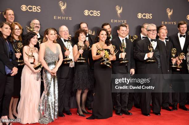 Cast and crew of 'Veep,' winner of the Outstanding Comedy Series award, pose in the press room during the 69th Annual Primetime Emmy Awards at...