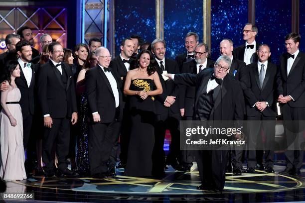 The cast and crew of 'Veep' accept the award for Outstanding Comedy Series onstage during the 69th Annual Primetime Emmy Awards at Microsoft Theater...