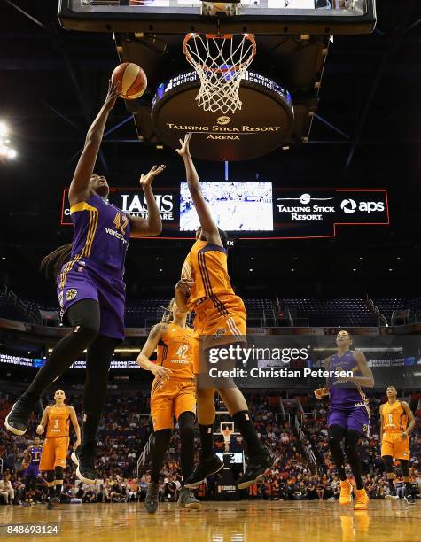 Jantel Lavender of the Los Angeles Sparks attempts a shot over Camille Little of the Phoenix Mercury during the second half of semifinal game three...