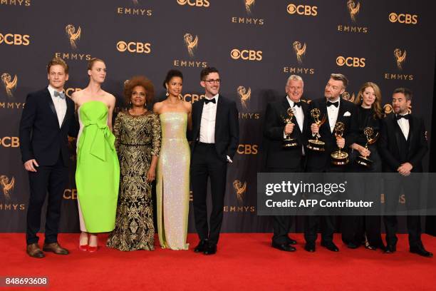 Charlie Brooker and " Black Mirror" cast pose with the Emmy for Outstanding Writing for a Limited Series, Movie, or Dramatic Special during the 69th...