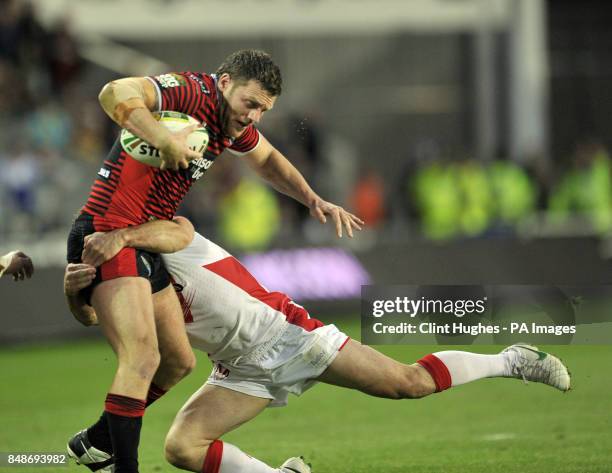 St Helens's Lance Hohaia tackles Warrington Wolves's Simon Grix during the Stobart Super League Semi Final, Langtree Park, St Helens.