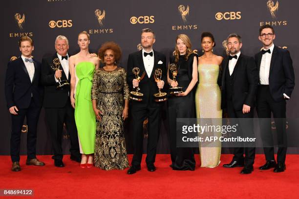 Charlie Brooker and the "Black Mirror" cast pose with the Emmy for Outstanding Writing for a Limited Series, Movie, or Dramatic Special during the...