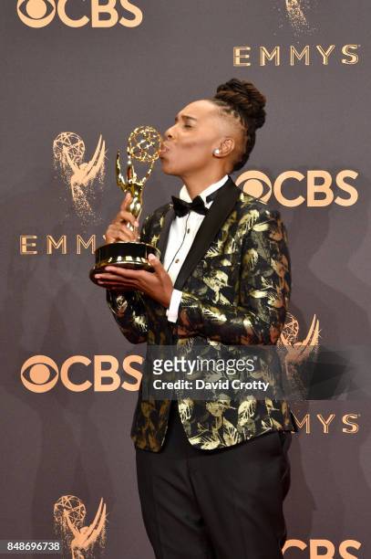 Writer Lena Waithe, co-winner of the Outstanding Writing for a Comedy Series award for 'Master of None,' poses in the press room during the 69th...