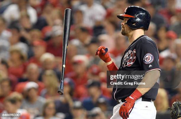 Matt Wieters of the Washington Nationals flips his bat after striking out in the sixth inning against the Los Angeles Dodgers at Nationals Park on...